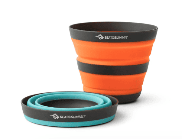 Two collapsible silicone cups—one orange, one blue—perfect as Backpacking Gear for your Pacific Crest Trail adventures.