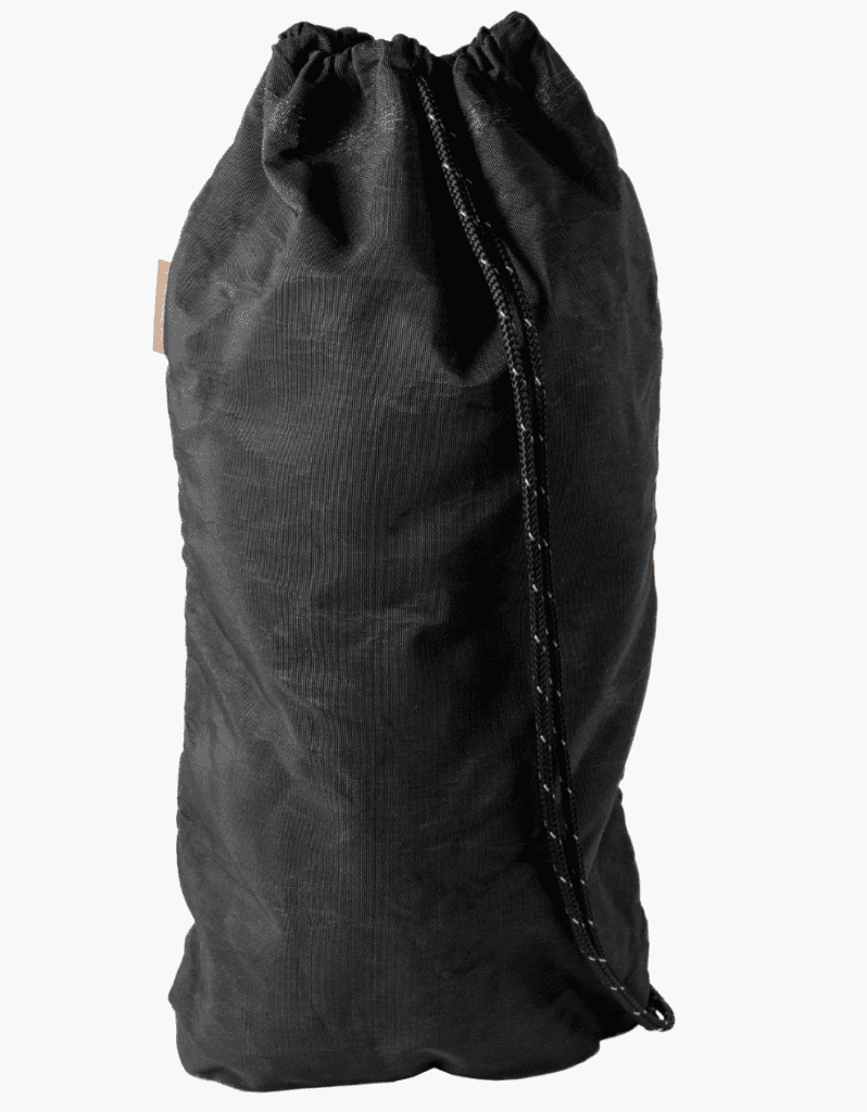 A black drawstring bag with a black and white cord, perfect for backpacking gear or adventures on the Pacific Crest Trail.