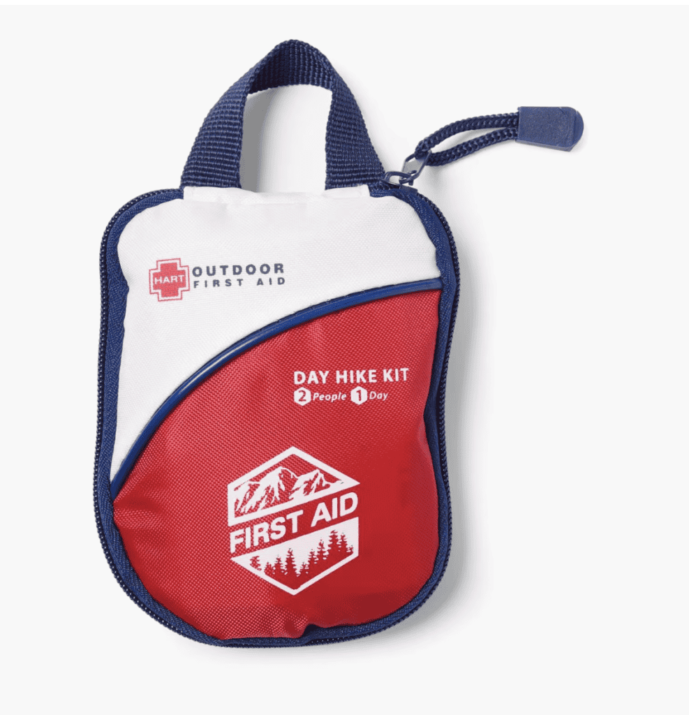 Compact red and white first aid kit for two, ideal hiking equipment for one day on the Pacific Crest Trail, with zipper and carry handle.