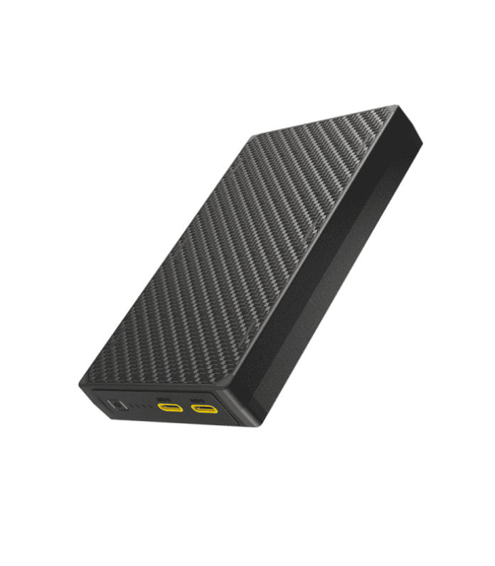 Rectangular black portable power bank, a must-have for your backpacking gear, with dual yellow USB-C ports and a textured surface.