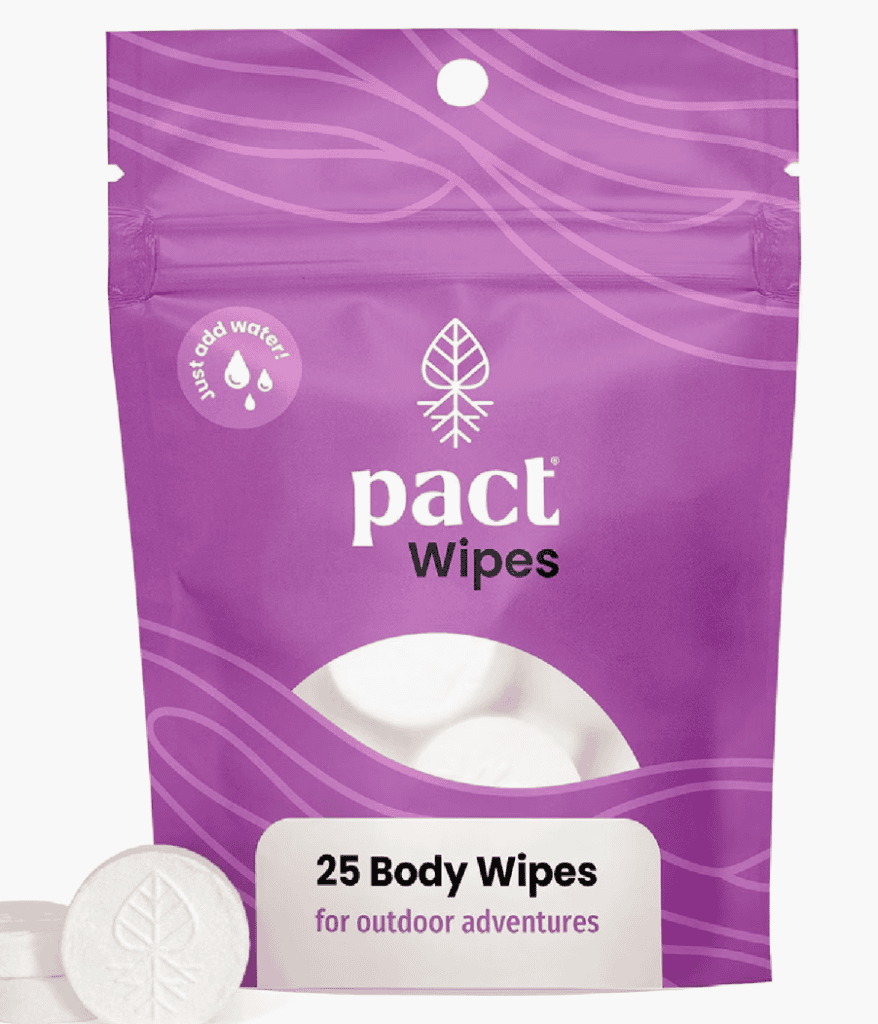 A purple pouch labeled pact Wipes holds 25 body wipes—essential backpacking gear for Pacific Crest Trail or outdoor adventures.