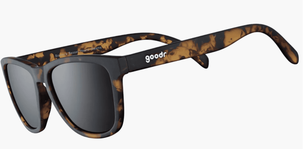 Tortoiseshell Goodr sunglasses with black lenses—perfect backpacking gear for your next Pacific Crest Trail adventure.