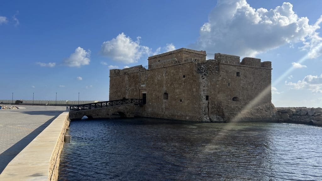 Paphos Castle in Cyprus, a stone fortress connected to the shore by a wooden bridge, is a highlight of any 3 day Cyprus itinerary.